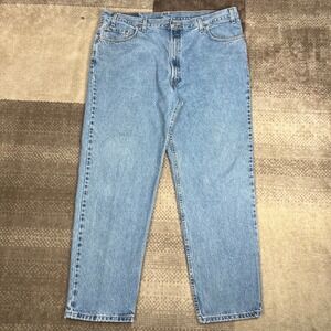 Vintage Levis 550 Relaxed Fit Mens Jeans Light Wash Made in USA 44X32 Blue Denim